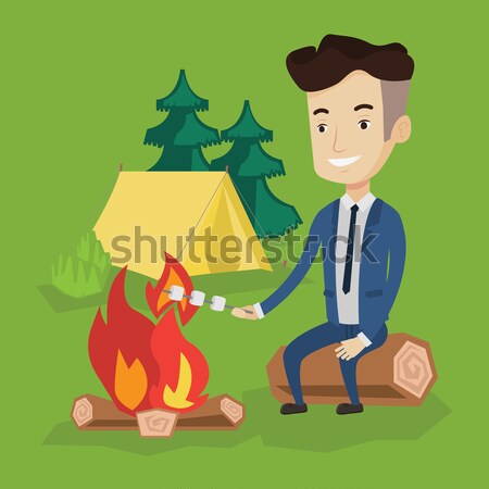 Empresário marshmallow fogueira feliz terno sessão Foto stock © RAStudio