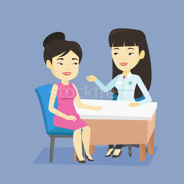 Doctor consulting female patient in office. Stock photo © RAStudio