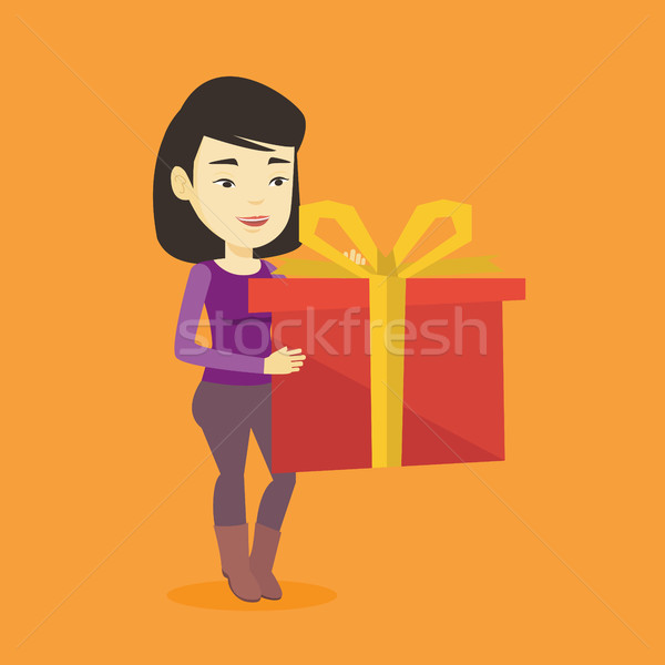 Joyeux asian femme boîte cadeau [[stock_photo]] © RAStudio