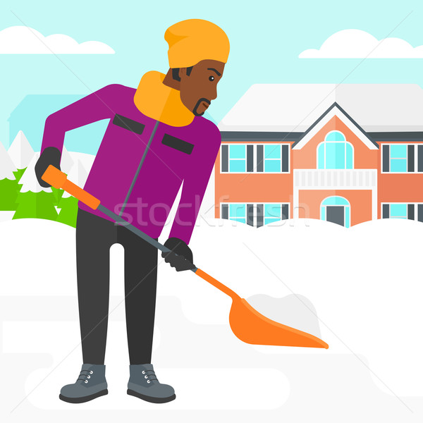 Man shoveling and removing snow. Stock photo © RAStudio