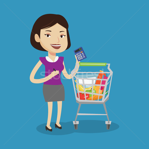商业照片: 女· 顾客 · 计算器 · 年轻 · 女子