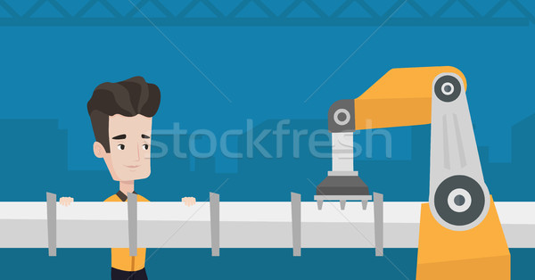 Refinery worker and robotic arm repairing pipeline Stock photo © RAStudio