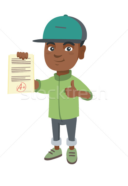Pupil holding a sheet with the highest mark. Stock photo © RAStudio