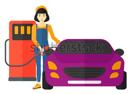 Woman filling up fuel into car. Stock photo © RAStudio