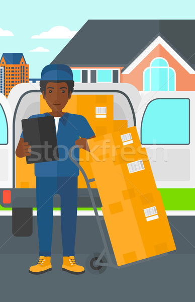 Man delivering boxes. Stock photo © RAStudio