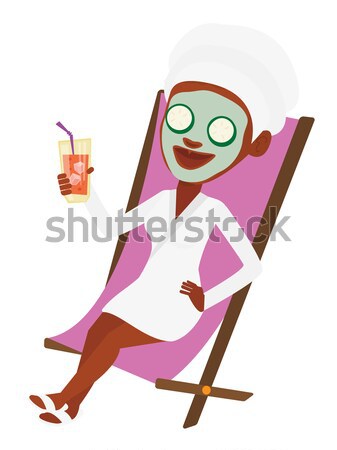 Woman sitting in a folding chair. Stock photo © RAStudio