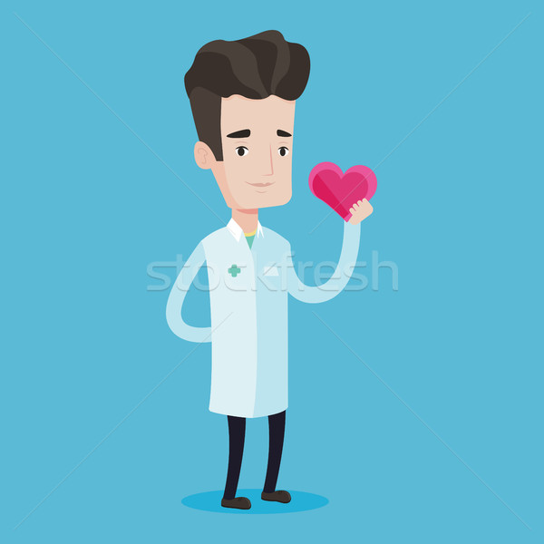Arzt Kardiologe halten Herz medizinischen einheitliche Stock foto © RAStudio