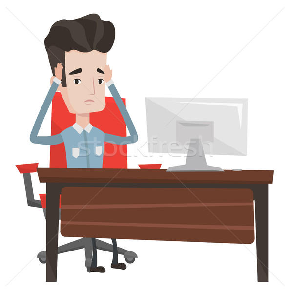 Stressful employee sitting at workplace. Stock photo © RAStudio