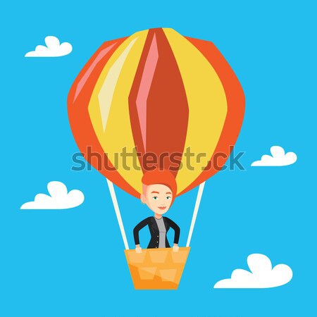 Mann unter Heißluftballon stehen legen Stock foto © RAStudio