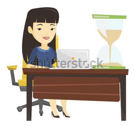 Asian business woman working in office. Stock photo © RAStudio