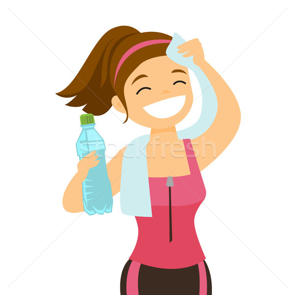 Caucasian sportswoman wiping sweat with a towel. Stock photo © RAStudio