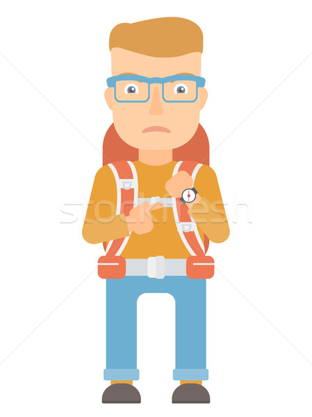 Angry backpacker pointing at wrist watch. Stock photo © RAStudio