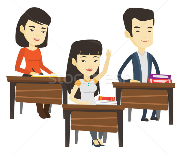 Student raising hand in class for an answer. Stock photo © RAStudio