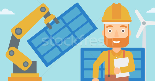 Robotic arm installing solar power pannel. Stock photo © RAStudio