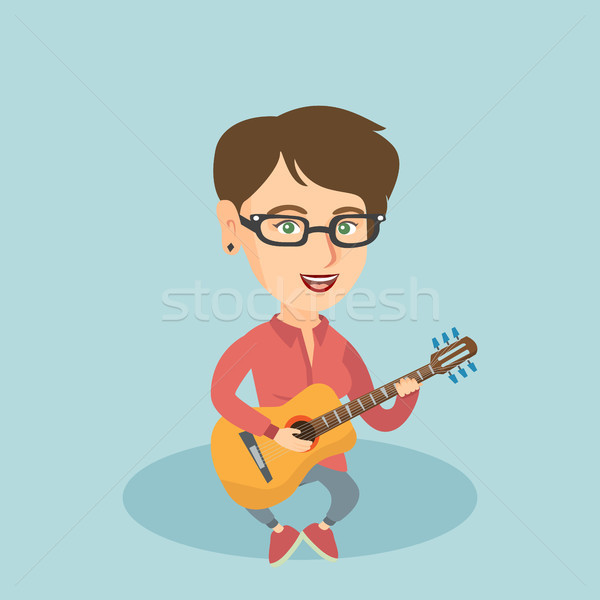 Jovem caucasiano mulher jogar violão músico Foto stock © RAStudio