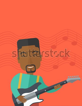 音樂家 播放 電吉他 微笑 鬍鬚 紅色 商業照片 © RAStudio