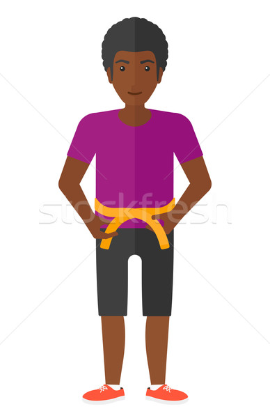 Man measuring waist. Stock photo © RAStudio