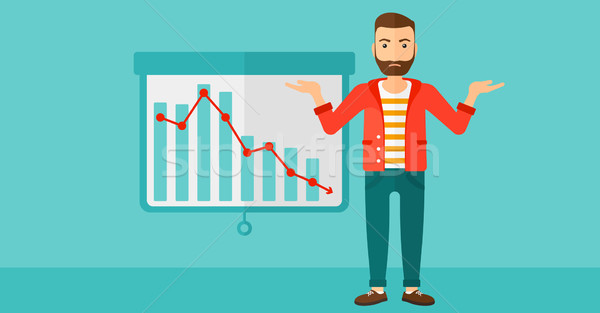 Man with decreasing chart. Stock photo © RAStudio