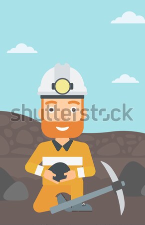 Stock photo: Miner holding coal in hands vector illustration.