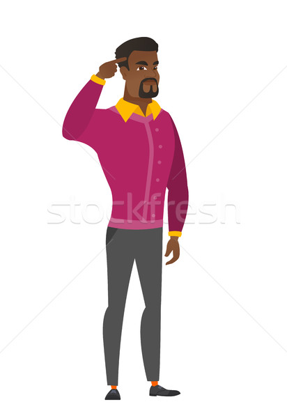 Angry man gesturing with his finger against temple Stock photo © RAStudio