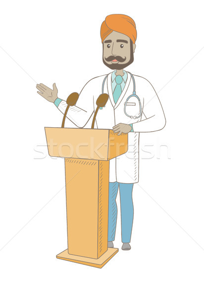 Indian doctor giving a speech from tribune. Stock photo © RAStudio