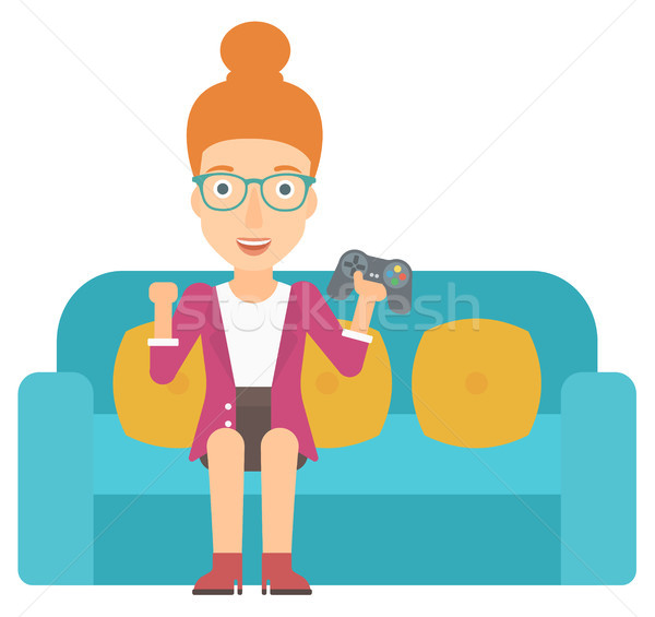 Woman playing video game. Stock photo © RAStudio