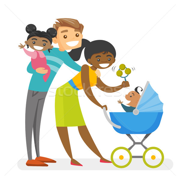 Happy diverse multiracial family with mulatto kids. Stock photo © RAStudio