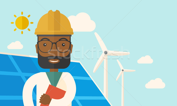 Black man in solar panel and windmills. Stock photo © RAStudio