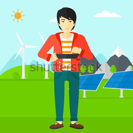 Man using tablet computer. Stock photo © RAStudio