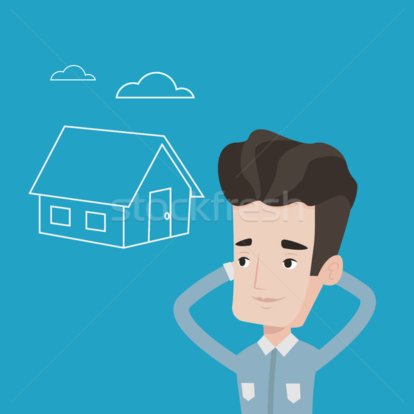 Stock photo: Man dreaming about buying new house.