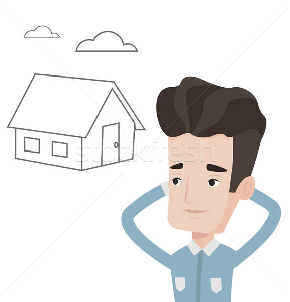 Man dreaming about buying new house. Stock photo © RAStudio