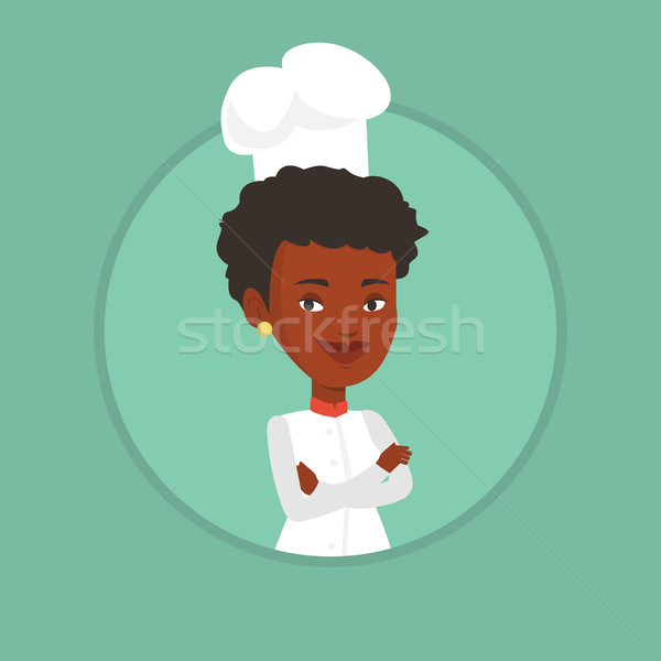 Stock photo: Confident female chef with arms crossed.