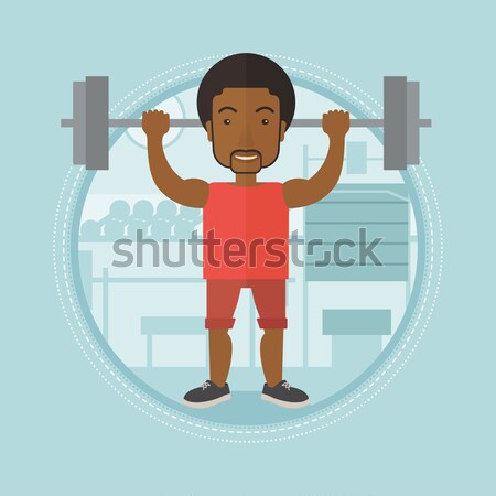 Férfi emel súlyzó sportoló testmozgás fiatalember Stock fotó © RAStudio