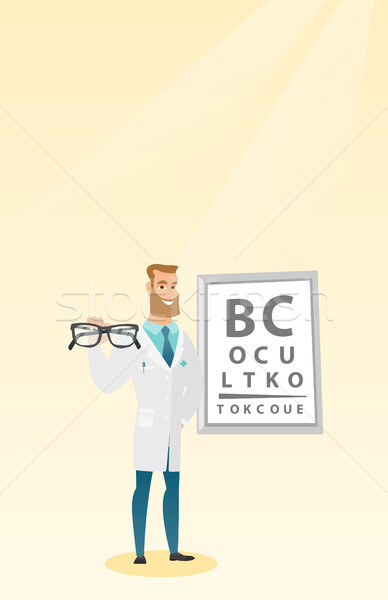 Professional ophthalmologist holding eyeglasses. Stock photo © RAStudio