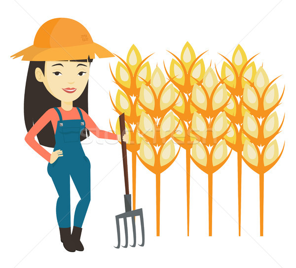 Farmer with pitchfork vector illustration. Stock photo © RAStudio