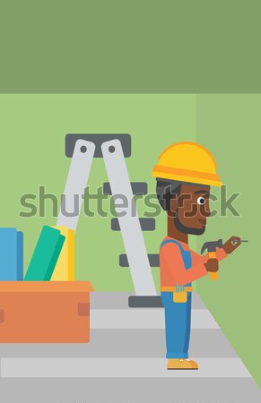 Constructor hammering nail. Stock photo © RAStudio