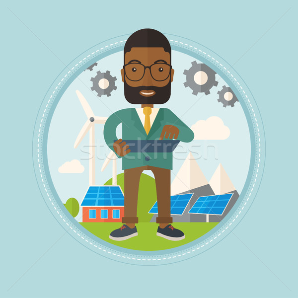 Masculino trabalhador energia solar planta parque eólico africano Foto stock © RAStudio