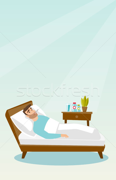 Sick man with thermometer laying in bed. Stock photo © RAStudio