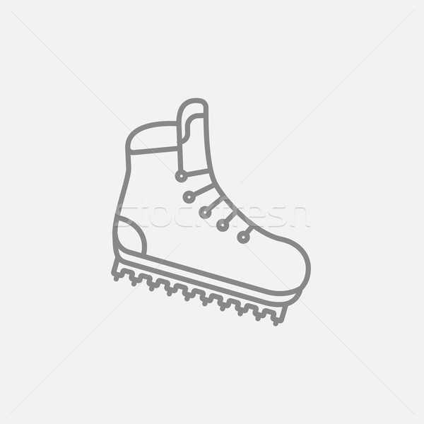 Hiking boot with crampons line icon. Stock photo © RAStudio