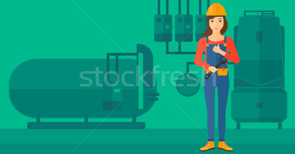 Cheerful repairer with spanner. Stock photo © RAStudio