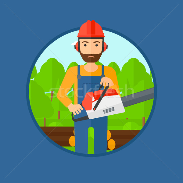 Woodcutter with chainsaw. Stock photo © RAStudio