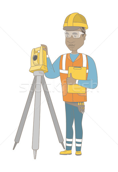 African surveyor builder working with theodolite. Stock photo © RAStudio