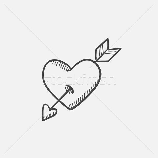 Stock photo: Heart pierced with arrow sketch icon.