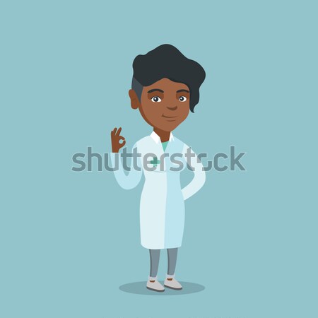 Stock photo: African-american waitress holding a glass of wine.
