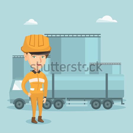 Girl on the background of fuel truck and oil plant Stock photo © RAStudio