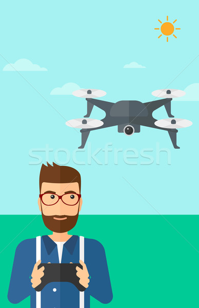 Man flying drone. Stock photo © RAStudio