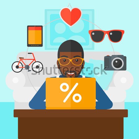 Woman shopping online using her laptop. Stock photo © RAStudio