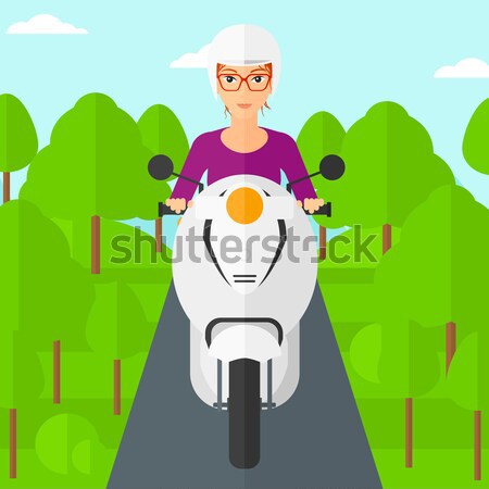 Woman riding scooter. Stock photo © RAStudio