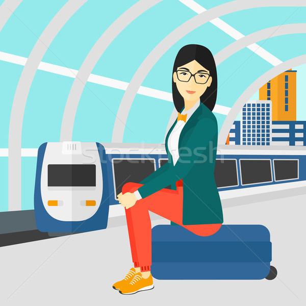 Woman sitting on railway platform. Stock photo © RAStudio