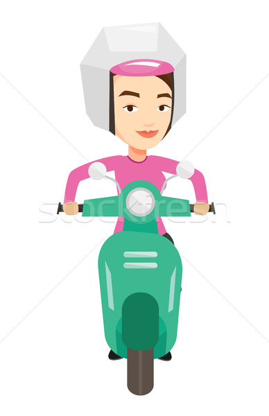 Woman riding scooter in the city. Stock photo © RAStudio